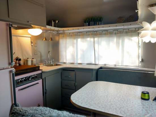 Vintage Camper Restoration - 1962 Streamline Dutchess - Interior After - close up dining area and kitchen