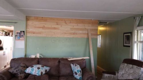 DIY mobile home transformation - installing shiplap on mobile home walls 2