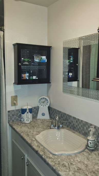 DIY mobile home transformation - sheet metal shower - before - sink