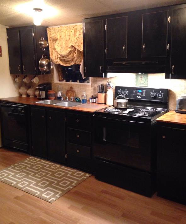 Farmhouse Inspired Manufactured Home Makeover (painted kitchen cabinets black after)