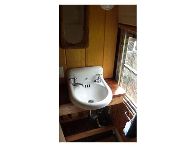vintage buses-sink in 1997 Bluebird International full length school bus to mobile home conversion